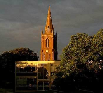 East Berks College with Trinity Church behind at sunset