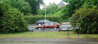 Broken fencing alongside Goslar Way