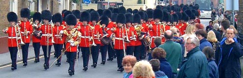 Marching past Clarence Crescent