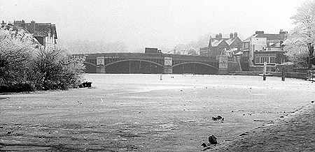 Tarpaulins hang beneath Windsor Bridge